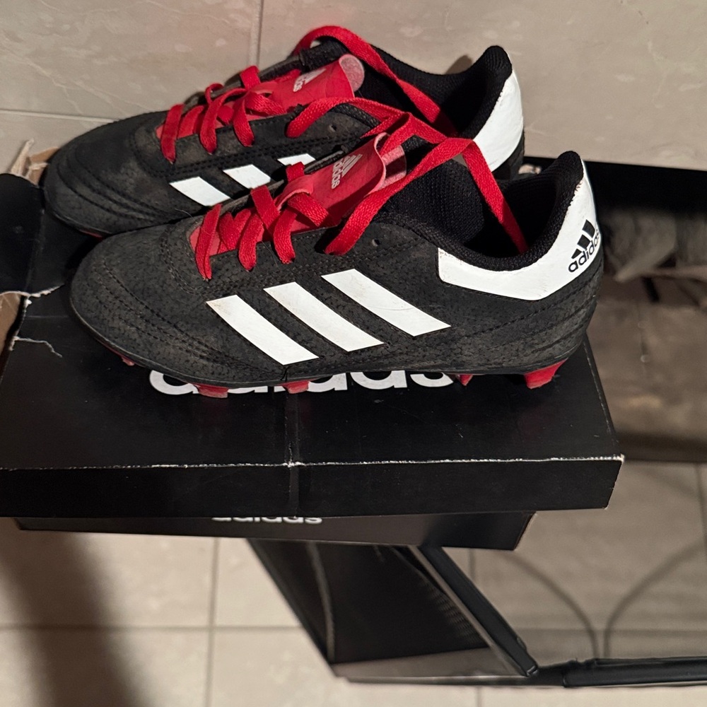 Adidas Black and White Cleats with Red Details